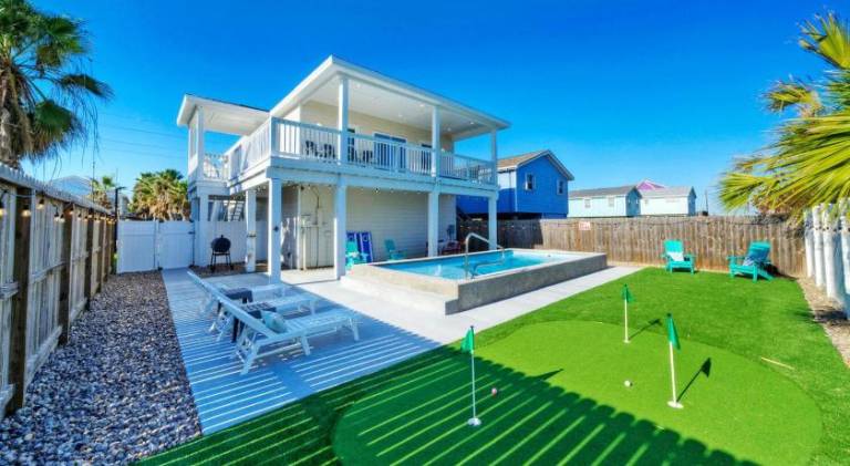Vacation home with terrace, pool & grill in Port Aransas, TX