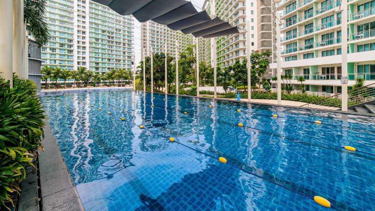 Lovely Condo Unit with Man Made Beach — photo 3