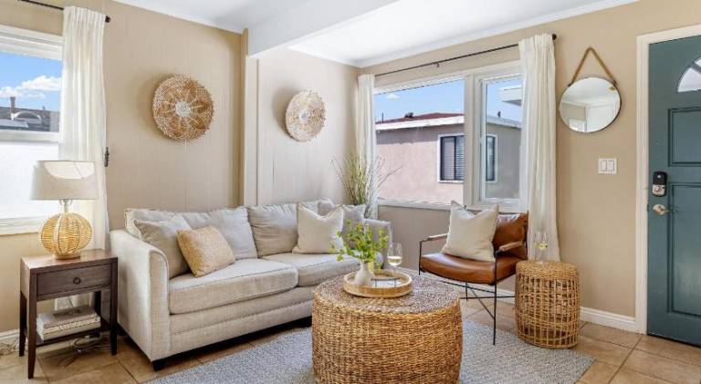 Waterfront Views Shared Dock Short Walk to Beach Shops Surf Edgewater B by AvantStay in Newport