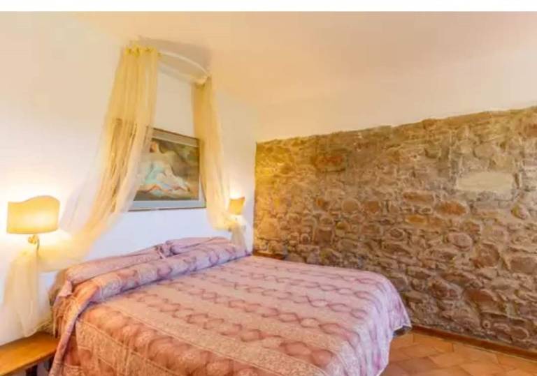 Tenuta Orgiaglia - Agriturismo Bio: Camera matrimoniale pianoterra con pergola e tavolo privato
