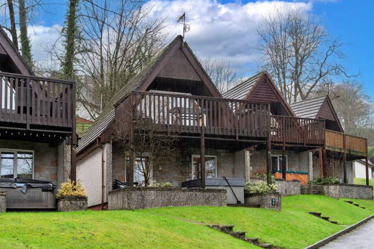 Family-friendly charming chalet with pool, jacuzzi & yard | Water view | Pets are welcome — photo 2