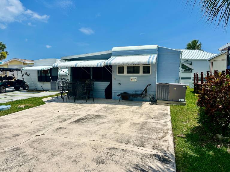 Whimsical 1/1 beach bungalow is a coastal gem in Jensen Beach, FL