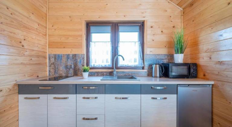 Lodge with grill, jacuzzi & garden | Pets allowed — photo 3