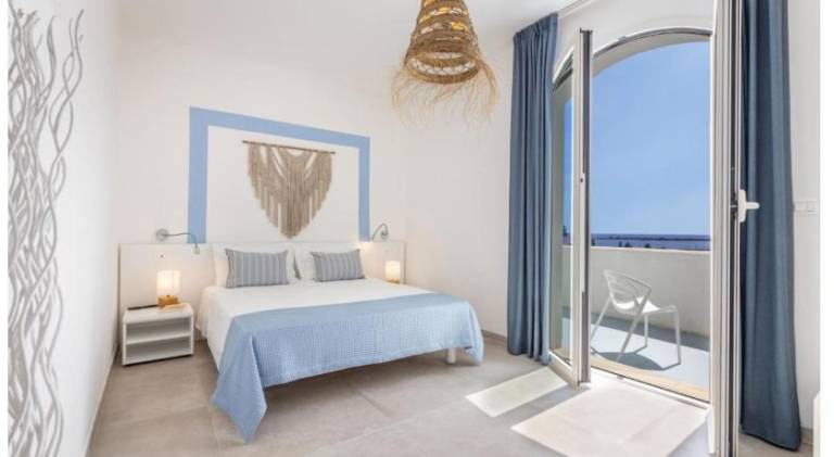 Rental apartment with BBQ, terrace & yard in Porto Cesareo