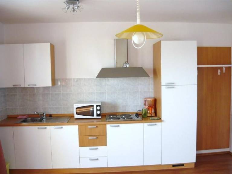 Apartment with barbecue & patio — photo 3