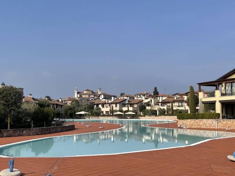La Rocca Di Manerba relaxing pool By Bookinggarda in Manerba del Garda