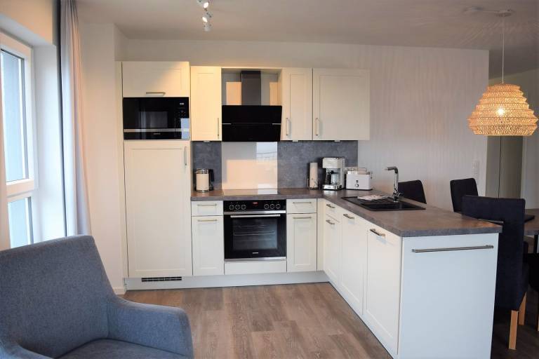 Moderne, hochwertige Ferienwohnung, Sauna, großer Balkon, Meerblick, strandnah — photo 3