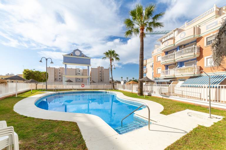 Apartment 'Esbamar Vi' with Shared Pool, Wi-Fi and Air Conditioning in Roquetas de Mar