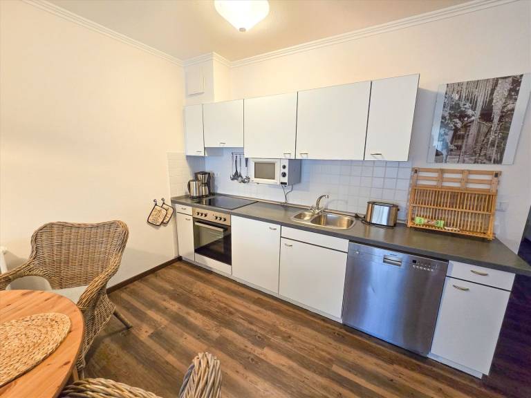 Komfortplus Ferienwohnung mit 1 Schlafzimmer und Balkon im Obergeschoss — photo 2