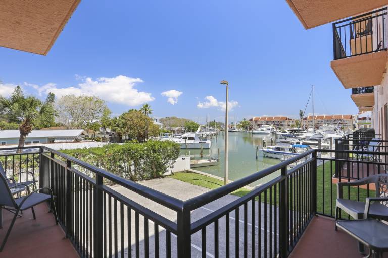 Condo with hot tub & heated pool | Water view — photo 3