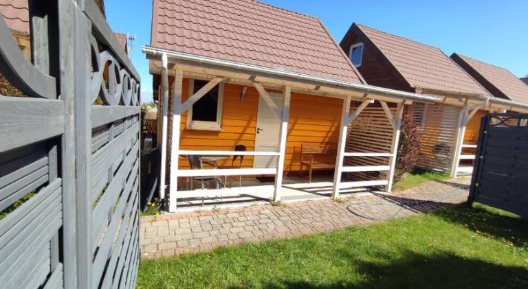 Lodge with terrace, garden & BBQ in Ustka