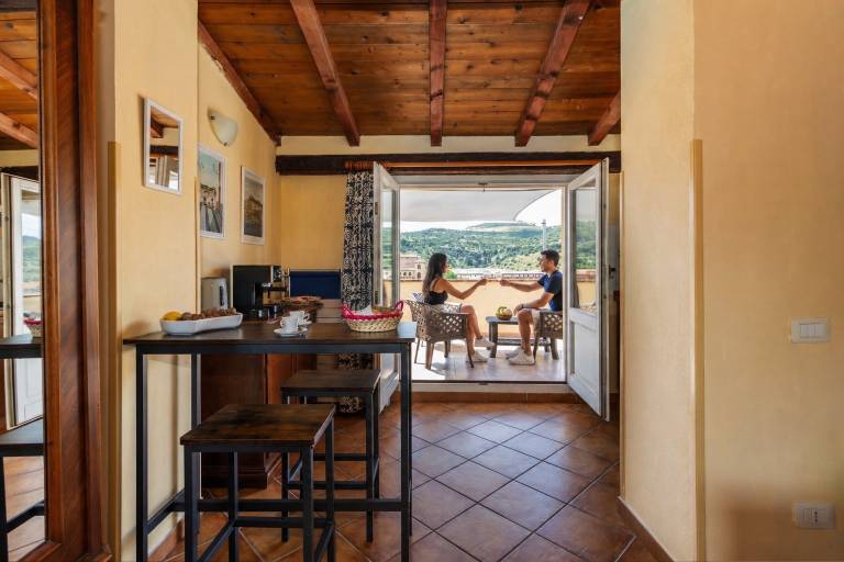 Apartment 'L'attico Sul Fiume' with Private Terrace, Wi-Fi and Air Conditioning in Bosa