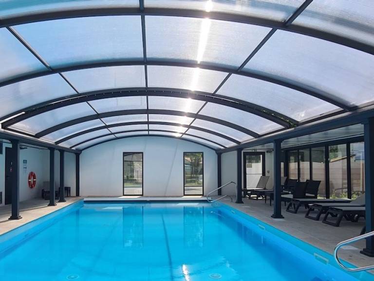 Mobile home with patio, BBQ & heated pool | Garden view — photo 3