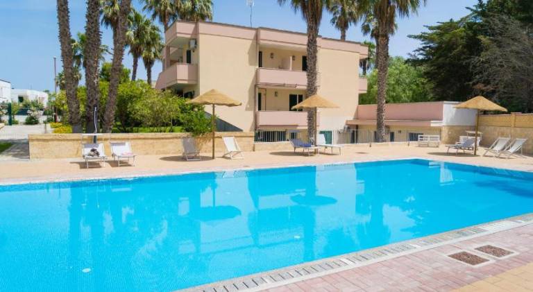 Serviced apartment with terrace, pool & yard in Melendugno