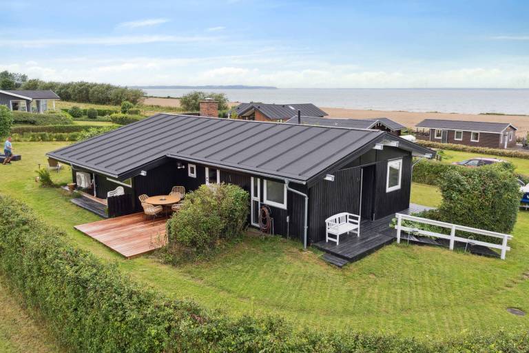 Lovely summerhouse by Skaastrup Strand w sea view in Bogense