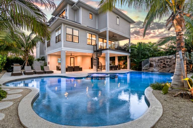 Family-oriented house with private pool, hot tub & grill | Water view | Beach nearby | Dogs allowed in Sarasota, FL