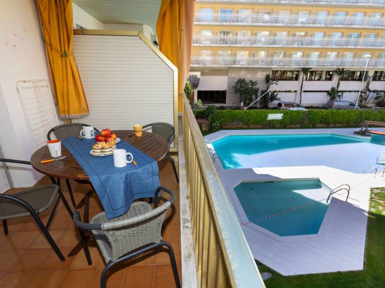 Holiday apartment with terrace, yard & pool — photo 2
