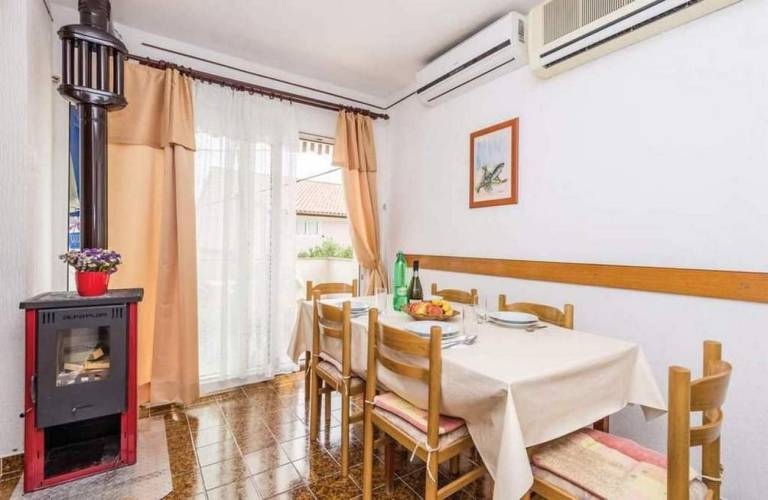 Two bedroom apartment with terrace and sea view Barbat, Rab (A-22498-b) — photo 5