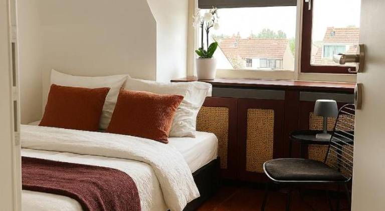 Sfeervolle kamer aan de Dorpsdijk met Gratis Ontbijt