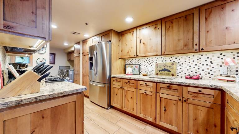 Condo with barbeque, jacuzzi & sauna — photo 2