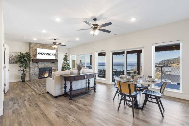 The House with it all! Free Group Tickets, Great Lake View, Hot Tub, Fireplace, Grill, Golf Deals! — photo 2