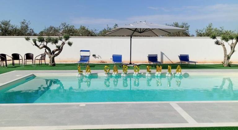 Pleasant rental apartment with yard, pool & patio | Pets allowed in Marsala