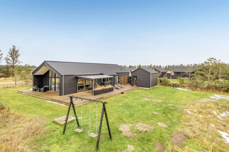 Vacation home with sauna, barbeque & patio in Lokken