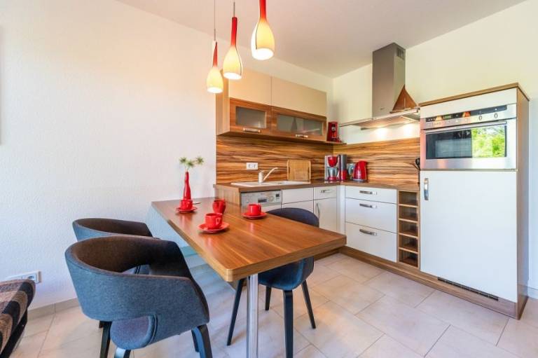 Gemütliche Ferienwohnung mit überdachter Terrasse, direkt am Strand — photo 3