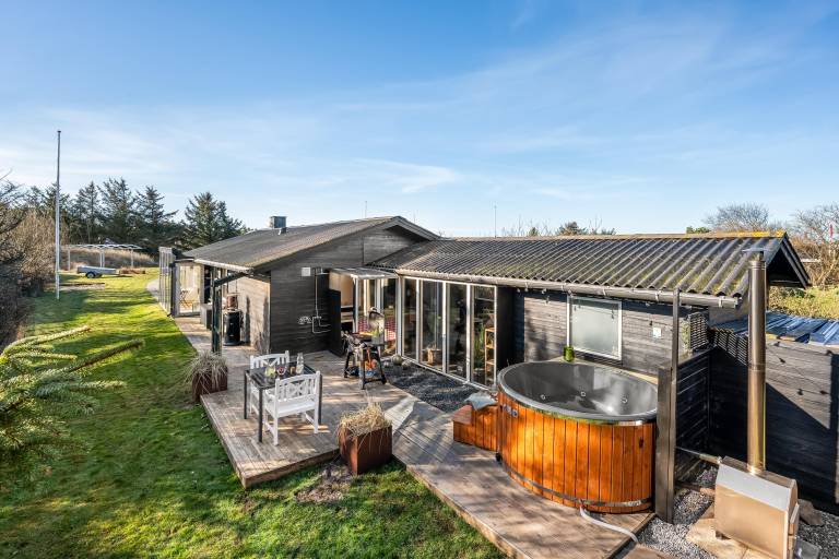 Lovely holiday home with a wilderness bath, close to the North Sea and Søndervig Center. in Ringkobing