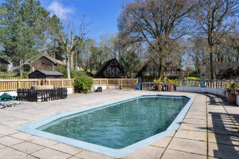 Family-friendly charming chalet with pool, jacuzzi & yard | Water view | Pets are welcome — photo 5