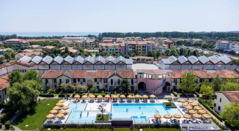 Apartment with patio, pool & yard in Caorle