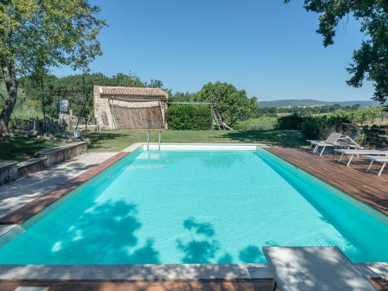 Vacation home with private pool, patio & yard — photo 5