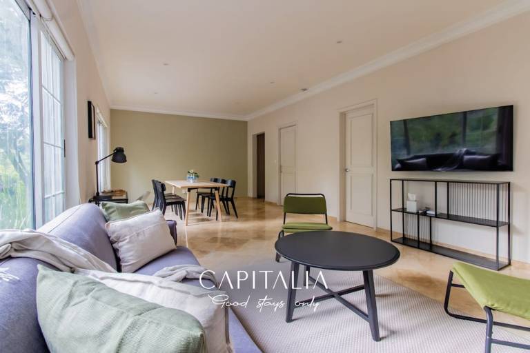 Capitalia Modern 1BR Escape