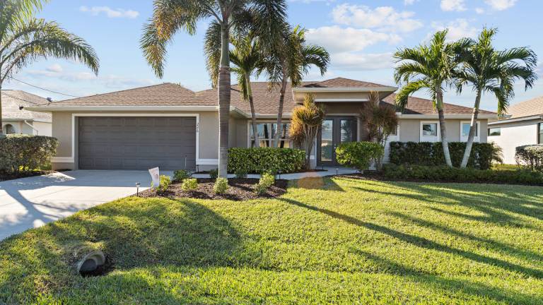 Vacation home with private pool, patio & barbeque | Water view in Cape Coral, FL