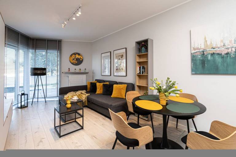 Family-oriented lovely holiday apartment with garden, sauna & pool | Next to the beach | Pet-friendly in Koszalin