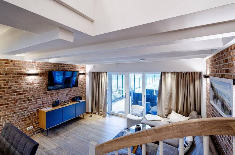 FeWo Sandburg: 115 m² Apartment auf 2 Etagen mit Sauna, Balkon & Dünenblick — photo 2