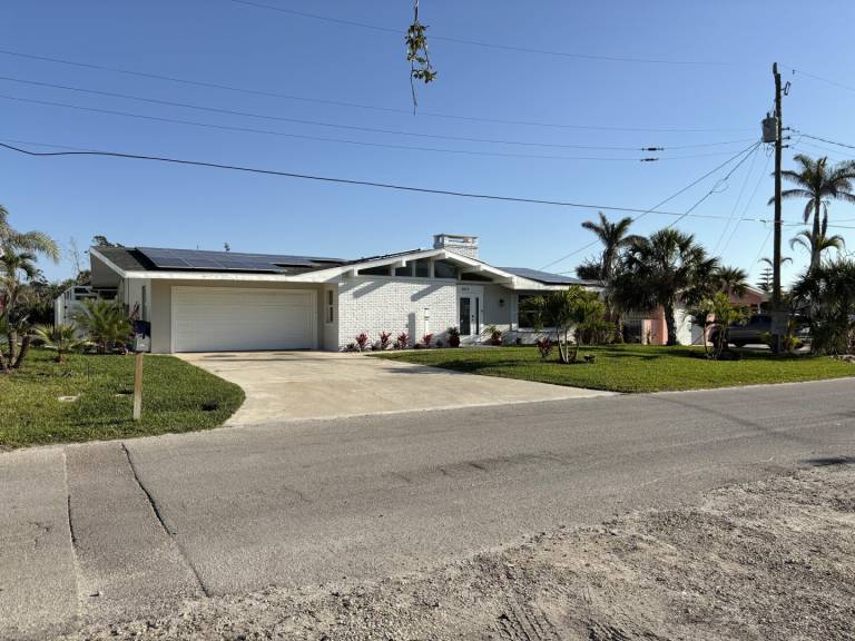 3 Bedroom 1 story home on canal with private pool just steps to Fort Myers beach — photo 2