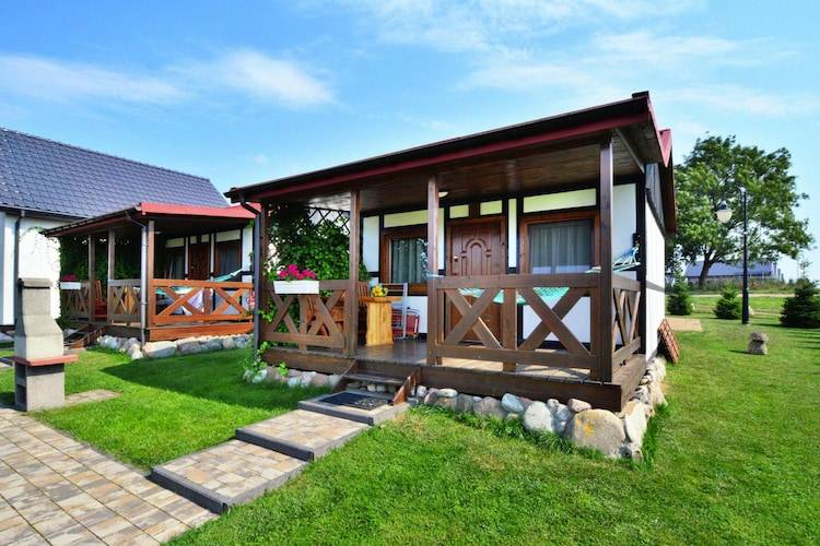 Family-oriented house with grill, terrace & yard | Pets are welcome in Darlowo