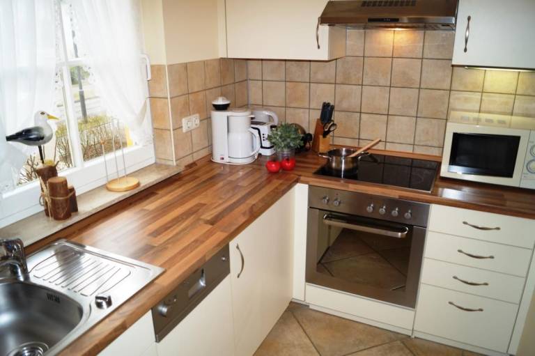 Schöne Wohnung mit Terrasse, Strandkorb und 2 TVs — photo 5