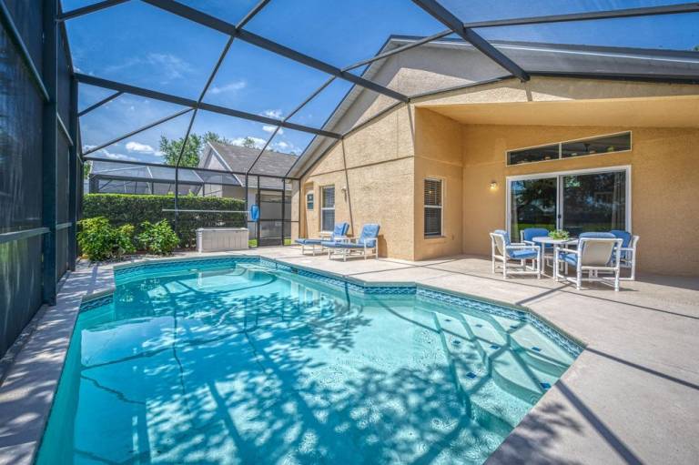 Charming 3BR home in Kissimmee with private pool and lake view, perfect for families. in Osceola, FL