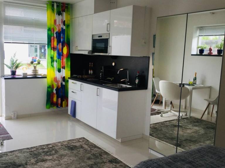 Family-friendly pleasant holiday apartment with garden & barbeque | Water view | Good for workation | Pets allowed — photo 4