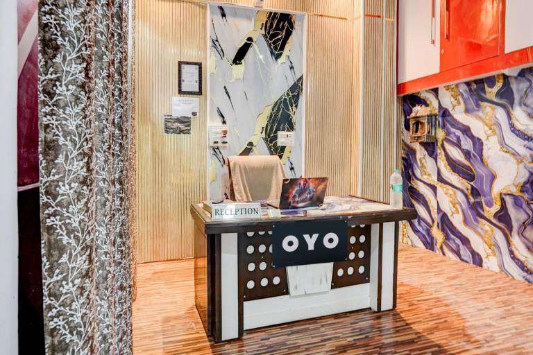 Hotel O Flagship Siddharth Hotel Yamuna Vihar C Block Stand