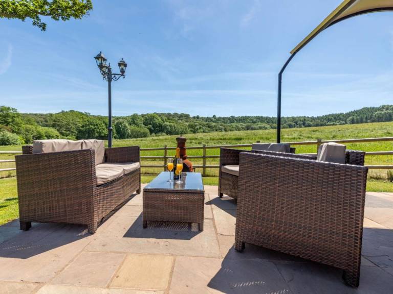 Camping suite with hot tub & garden | Water view — photo 4