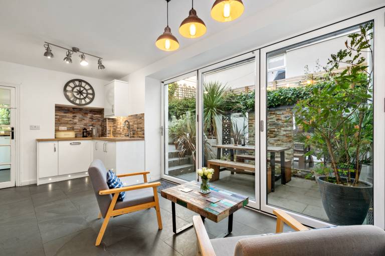 Family-oriented cottage with terrace & grill | Garden view | Next to the beach | Pets are welcome — photo 5