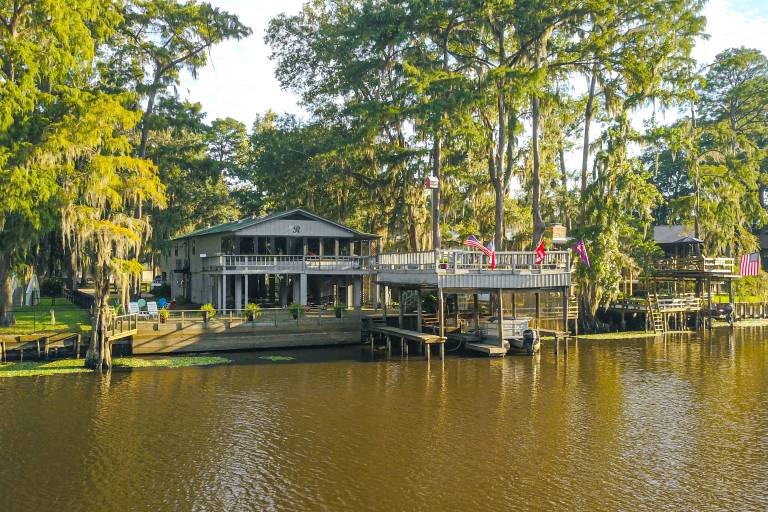 Lakefront Home Deck Grills & Fire Pit in Karnack