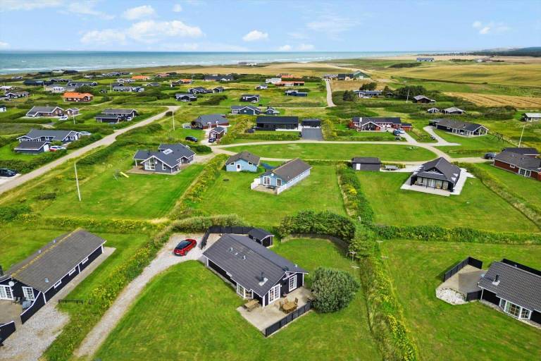 Vacation home with hot tub, grill & patio in Lokken