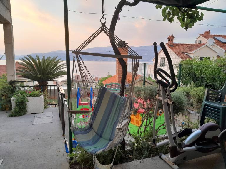 Two bedroom apartment with terrace and sea view Postira, Brač (A-2911-b) in Omis