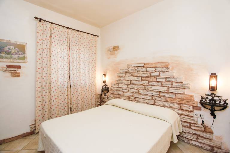 Holiday Home "mirtagru Casa dell'Olivastro" with Private Terrace and Wi-Fi in Budoni