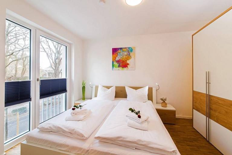 Modernes, strandnahes  Apartment mit großem Balkon, Fußbodenheizung u. Kaminofen — photo 5