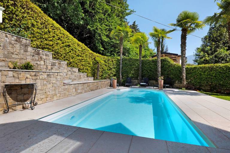Vacation home with patio, heated pool & yard | Garden view — photo 3